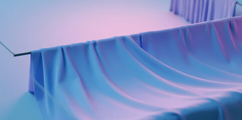 Smooth blue fabric draped over a surface with soft lighting and gentle folds