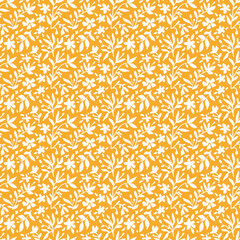 White flowers on yellow background seamless pattern. Botanical hand drawn repeat print. Silhouette floral design on mustard for textile, wrapping paper, fabrics and more.