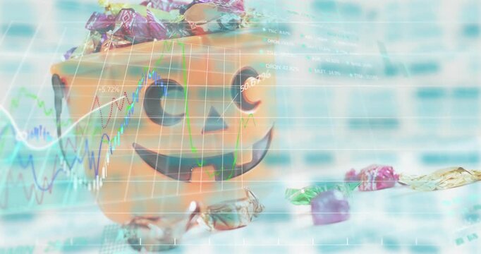 Financial graphs sliding over orange jacklantern bucket from initial focus, tracking market trends