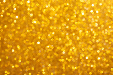 Abstract gold glitter sparkle texture with bokeh background