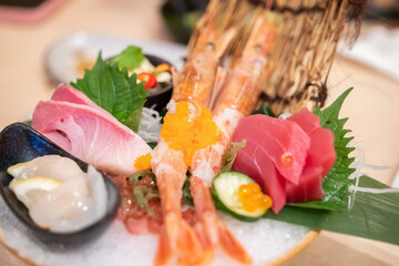 Fresh sashimi set serve on ice with wasabi Japanese style