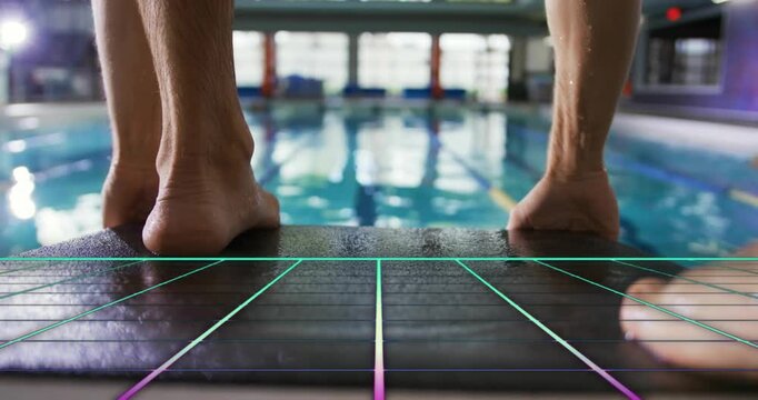 Male diver pressing on springboard grid markings over pool causing weight shifting, preparing dive