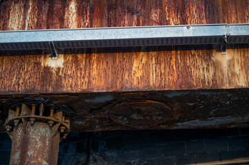 Rusty pillar at a harbor-port - Degraded city