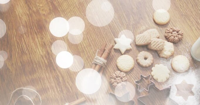 Bokeh drifting and fading revealing holiday cookies and milk glass sliding in to showcase baking