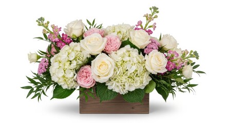 A beautiful floral arrangement of white hydrangeas and elegant pink and white roses in a rustic wooden box, isolated on a white background.