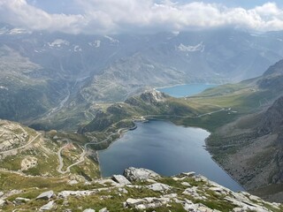 Panoramic view of the Nivolet Lakes, located in the Gran Paradiso National Park between Piedmont and Aosta Valley, Italy. The scene features two alpine lakes &mdash; Lago Serr&ugrave; and Lago Agnel