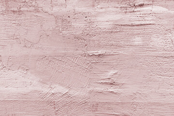 chic abstract background of a stone wall painted beige. The texture of natural stone with natural defects. A copy space. layout for design