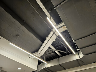 Fluorescent Lamps on Warehouse Ceiling.