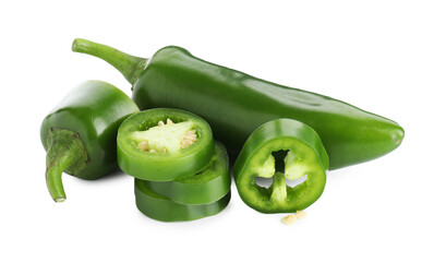 Whole and sliced green jalapeno peppers isolated on white