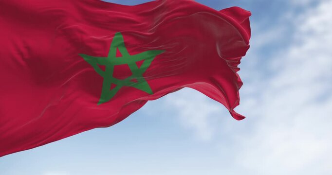Morocco national flag waving in the wind on a clear day - Powered by Adobe