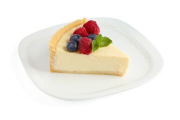 Piece of delicious cheesecake with fresh berries and mint isolated on white