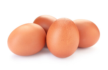 Many raw chicken eggs isolated on white