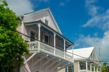 Conch house with a balcony, pastel colors architecture in Key West, Florida