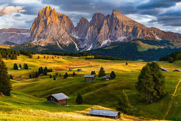 The UNESCO site Seiser Alm or Alpe di Siusi the Dolomite plateau and the largest high-elevation Alpine meadow in Europe located in Italy's South Tyrol province in the Dolomites in autumn sunset.