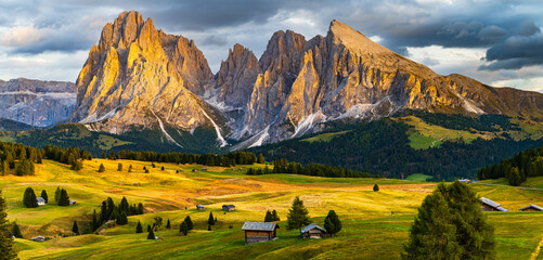 The UNESCO site Seiser Alm or Alpe di Siusi the Dolomite plateau and the largest high-elevation Alpine meadow in Europe located in Italy's South Tyrol province in the Dolomites in autumn sunset.