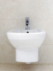 Wall mounted white ceramic bidet