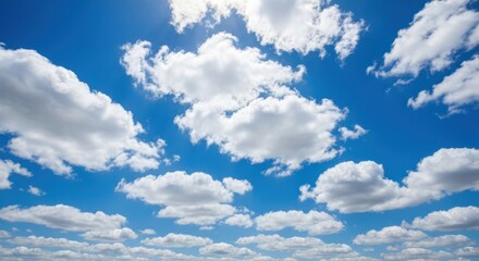 A vibrant blue sky dotted with fluffy white clouds