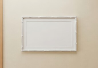 Minimalist rectangular white frame displaying a blank white canvas on a neutral beige wall, perfect for custom art or photo displays