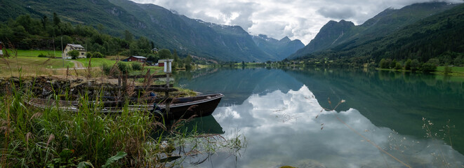 Amazing sky reflecting in Lake Floen in Olden in Nordfjord, Norway