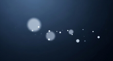 Soft glowing bokeh lights drift across a dark, serene background creating a magical, ethereal ambiance for creative projects.