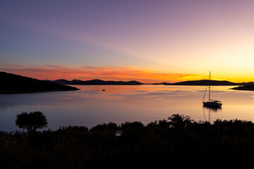 Silhouette of sailboat in spectacular sunset on the island of Pasman in Croatia