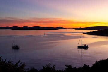 Silhouette of sailboat in spectacular sunset on the island of Pasman in Croatia