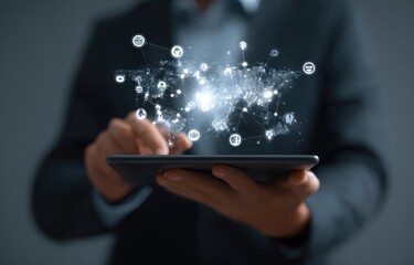 Businessperson interacts with tablet displaying global network