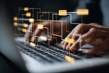 Hands typing on a laptop, overlaid with a flowchart-like system of interconnected boxes
