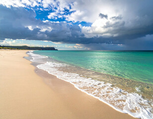 Obraz premium A serene view of Bureh beach with soft sand, clear waters, and a dramatic horizon.