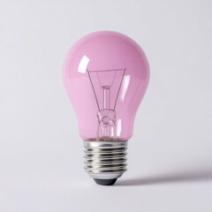 Pink light bulb on plain background