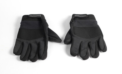 pair of jet black motorcycle gloves isolated on a white background