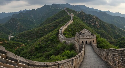 Historic Stone Wall of the Great Wall of China Winding Through Green Mountain Landscape