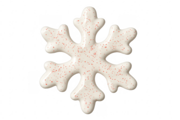 White snowflake cookie decorated with red sprinkles