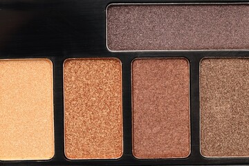 Beautiful eyeshadow palette as background, top view