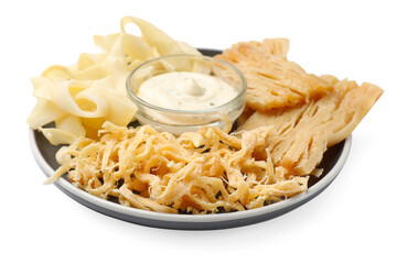 Tasty dried squid and sauce isolated on white