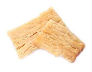 Pieces of tasty dried squid isolated on white, top view