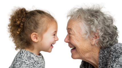 A joyful interaction between a child and an elderly woman, showcasing love and connection against a white background.