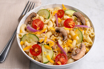 macaroni salad with tomatoes and mushrooms