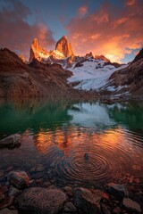 Sunrise over Fitz Roy, reflecting in a vibrant lake