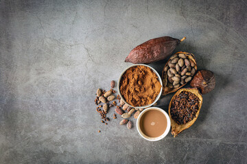 Top view of cocoa powder with cocoa drink and cut in half cacao pods, cocoa nibs and bean on white background