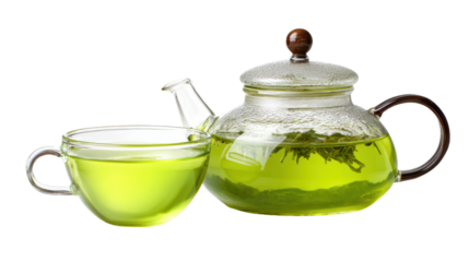 Green tea in a glass teapot and cup on a white background.