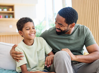 Portrait of a happy teenage boy son talking to his father at home. Sharing secrets and having fun, support and parenthood concept