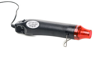 Compact electric heat gun isolated on white background
