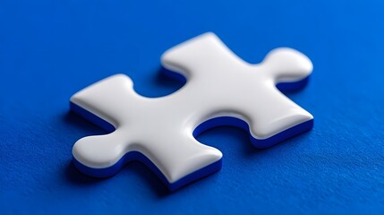 Obraz premium A single white puzzle piece against a vibrant blue background, symbolizing connection, integ n, and problem-solving.