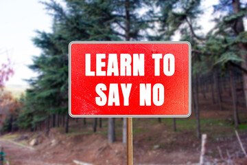 Learn to Say No message written on red road sign. Conceptual Learn to Say No symbol. Copy space.