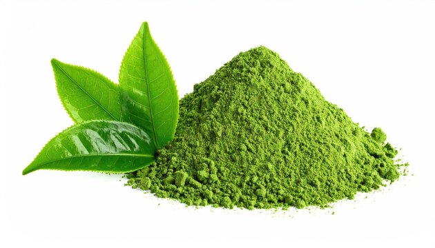 Pile of vibrant green matcha powder, fresh tea leaves