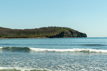 Dramatic Sea Cliffs and Clear Blue Ocean at Russky Island, Vladivostok, Russia
