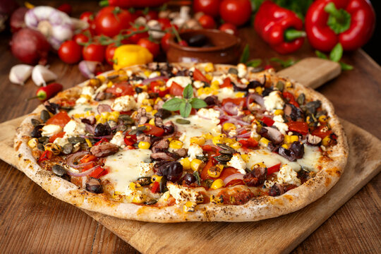 Spicy Mexican Style Vegetarian Pizza with Kidney Beans and Colorful Vegetables