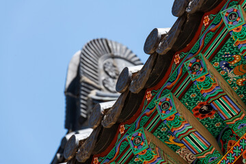 low angle view of the wooden eaves at the Buddhist temple building