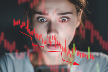 Worried woman watching falling stock market graph on smartphone.